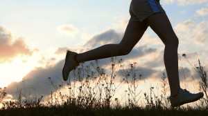 Silhouette woman run under blue sky with clouds (Why run?)